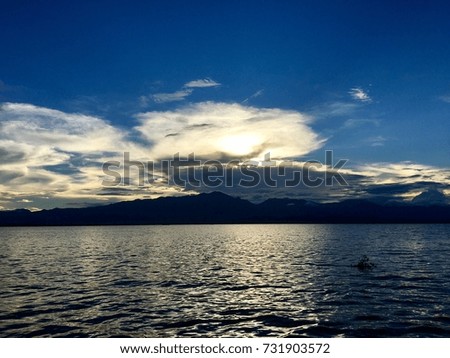 Pictures of lakes and skies near sunset.