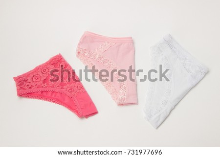 Women's panties with lace pink and white on the background