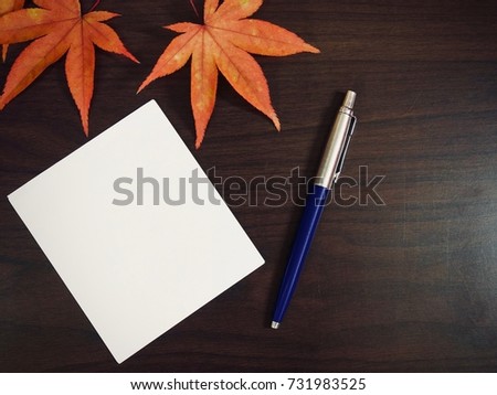 Maple leaves and photographs, postcards, notes

