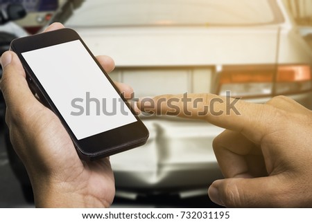 woman using smartphone at roadside after traffic accident, soft focus