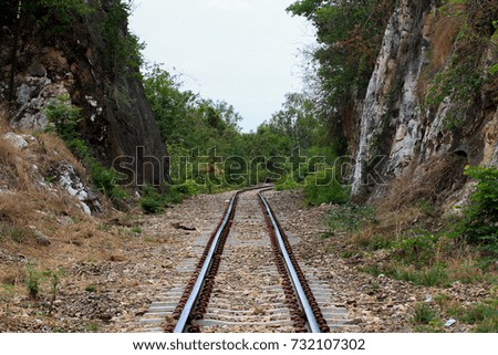 The railway passes through the hills.