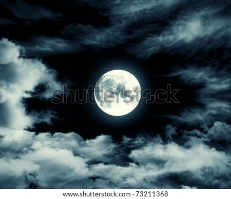 nightly sky with large moon