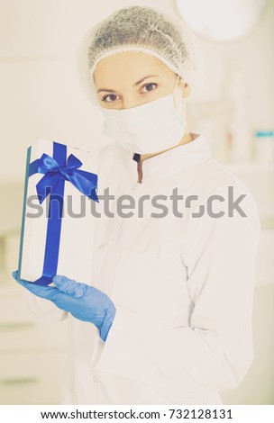 Young female Finnish nurse ready to receive patients in hospital