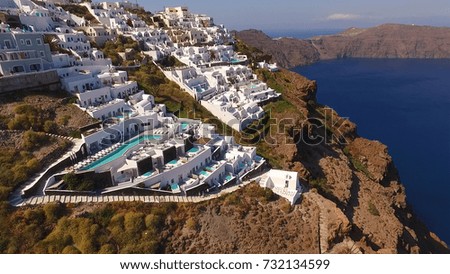 Aerial birds eye view photo taken by drone of volcanic island of Santorini, Imerovigli village with view to the caldera, Cyclades, Aegean, Greece