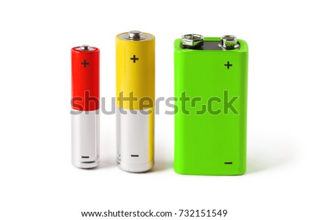 Three batteries (AAA, AA and PP3), isolated on white background Royalty-Free Stock Photo #732151549