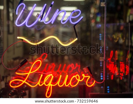 Wine and Liquor neon sign in the window of a Liquor store 