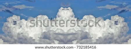 symmetrical photograph of storm clouds