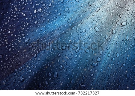 Water drops on the fabric. Abstract background