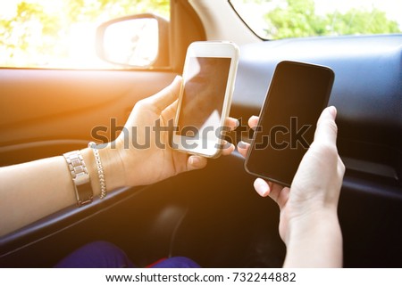 People are using mobile to buy products online,cell phones for social purposes, mobile phone to view a map of online travel, mobile press calculator, mobile games to play online,Black and white phone
