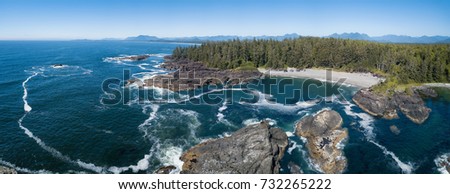 Beautiful rocky beach landscape at Pacific Ocean Coast. Picture taken South of Wickaninnish Beach near Tofino and Ucluelet on Vancouver Island, British Columbia, Canada.