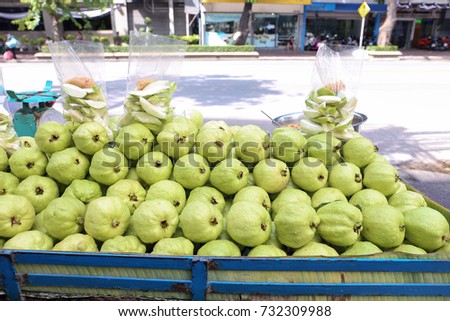 Fresh Kim Joo guava on a cart for sell at Pom Prap Sattru Phai, Bangkok, Thailand Royalty-Free Stock Photo #732309988