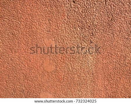 Old rough orange cement wall background texture
