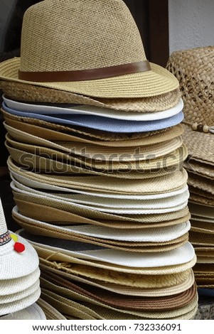 pile of hats in detail, straw hats picture