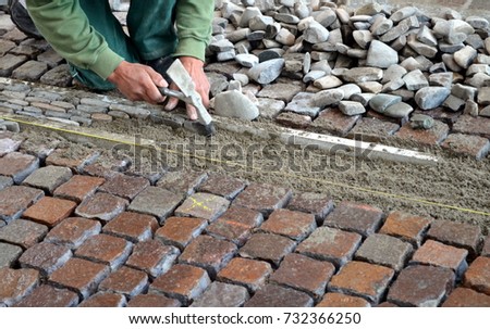 Laying of cobblestones