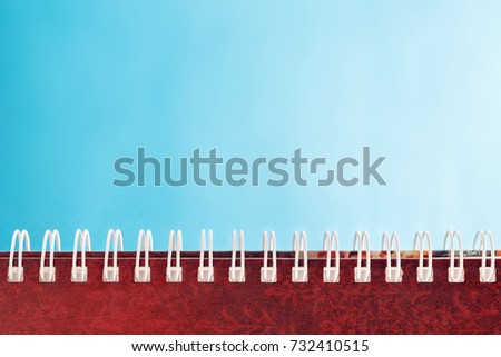 The image diary with spiral on blue background