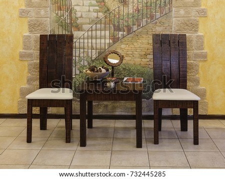 Table and chair in a visitor room