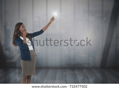 Digital composite of Businesswoman pointing by windows