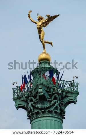 Gilt bronze statue of The Genius of Liberty, 1833, by Augustin Dumont  (1801–1884) topping the July Column at the Place de la Bastille in Paris, shows Mercury who broken his chains and is liberated