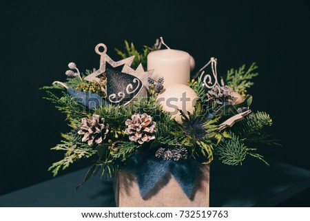 Christmas floral composition. a New Year's bouquet with candles