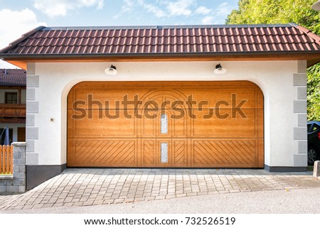 Family house automatic garage segmented door. Picture taken in Austria.
