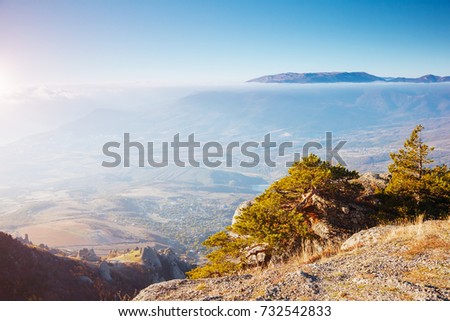 Picture of a scenic range in morning light. Location Crimea, Crimean peninsula, Ukraine, Europe. Incredible wallpapers. Discover the beauty of earth. Unusual image of wild area. Soft focus effect.
