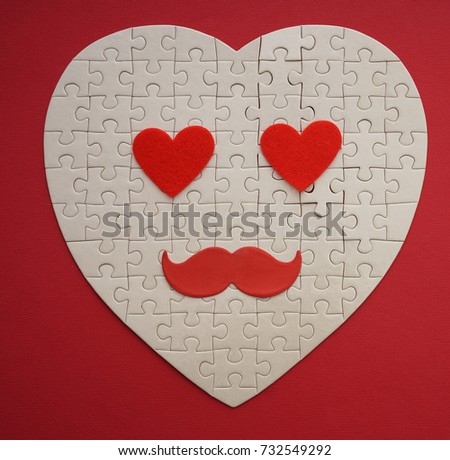 one heart from many puzzles, Symbol of love,for valentine's day, couple of eyes in the form of red heart , face design with eyes and mustache. mankind idea, sign, symbol, concept