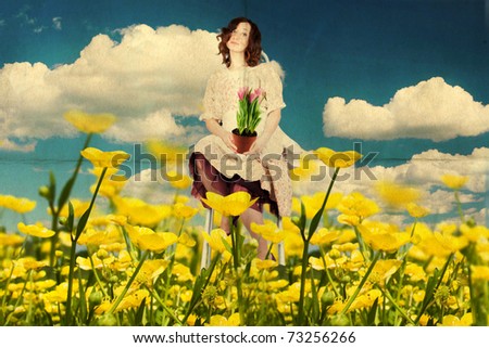 beauty young woman in dress on the meadow with flowers tulips