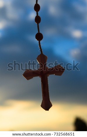 Christian cross on sky