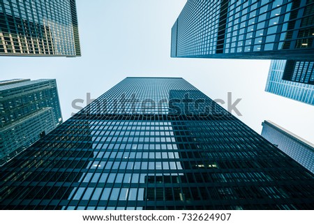 An abstract shot looking up at various skyscrapers