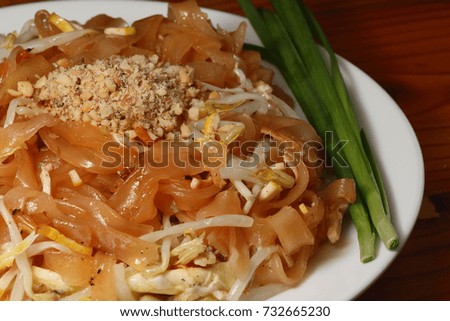 Pad Thai,  fried noodles on wood table