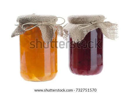 Homemade berry jams in jar isolated on white background.    