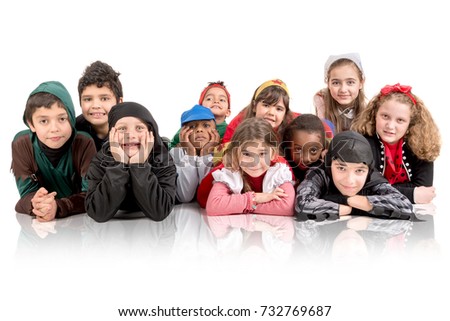 Group of kids in Halloween/Canaval costumes isolated
