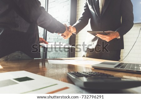Business partnership meeting concept. Image businessmans handshake. Successful businessmen handshaking after good deal. Group support concept. Royalty-Free Stock Photo #732796291