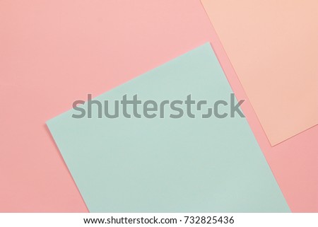 Colorful pastel paper stacks background.