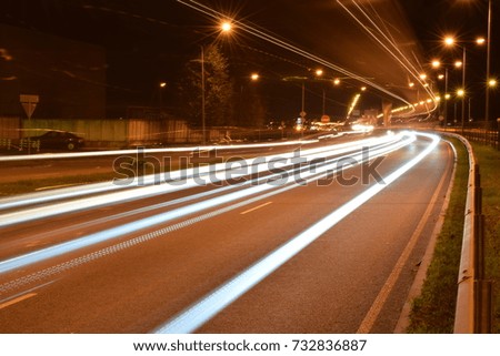 Car lights by the highway