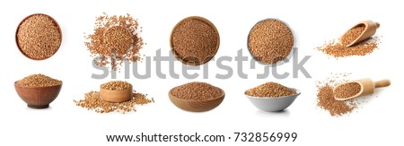 Buckwheat in different dishware on white background Royalty-Free Stock Photo #732856999
