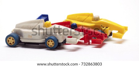 old children's racing car on a white background/old race car/isolated objects