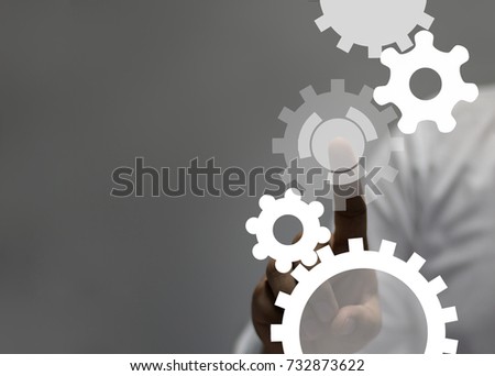 engineer draws a chain sprockets. Technology and industry concept Royalty-Free Stock Photo #732873622