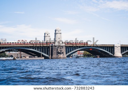 Boston subway train bridge. Lechmere Viaduct, viewed looking southward from East Cambridge (Charles River Dam is visible through Viaduct arches)
