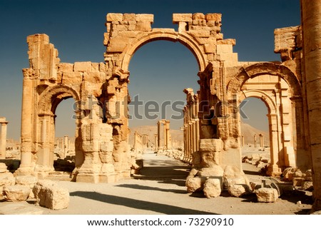 Ruins of ancient city of Palmyra in Syria desert. Royalty-Free Stock Photo #73290910