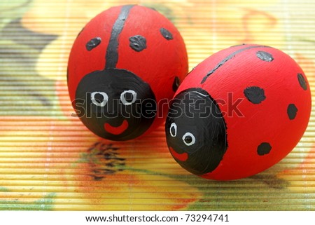 Easter eggs painted in a pattern red ladybird