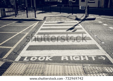 Look right sign on the zebra crossing in bolton town street