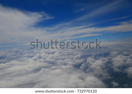 Beautiful blue sky with clouds view from airplane's window , Cloudscape , blue sky background
