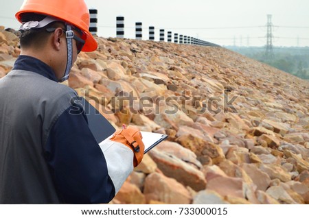 Engineers working at the dam,Dam for electricity generation