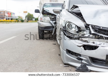 Modern car accident involving two cars on the road in Thailand Royalty-Free Stock Photo #733006537