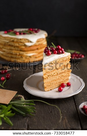 Honey nut ginger and carrot cake decorated with cranberries and rosemary. Perfect Christmas baked goods that you want to eat!)