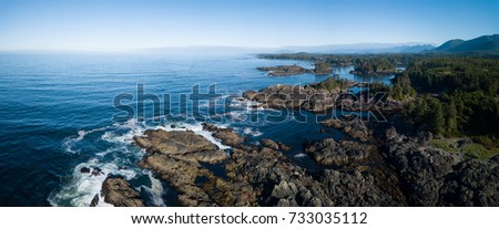 Beautiful rocky beach landscape at Pacific Ocean Coast. Picture taken South of Wickaninnish Beach near Tofino and Ucluelet on Vancouver Island, British Columbia, Canada.