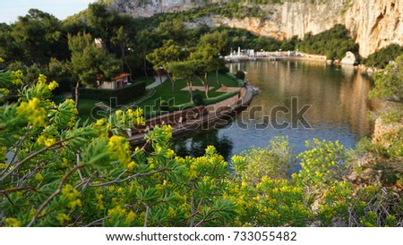 Spring photo from reflecting lake Vouliagmeni famous for healing abilities, Vouliagmeni, Attica, Greece