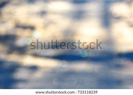 Blurred winter background with colored lights