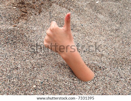 Hand  over sand